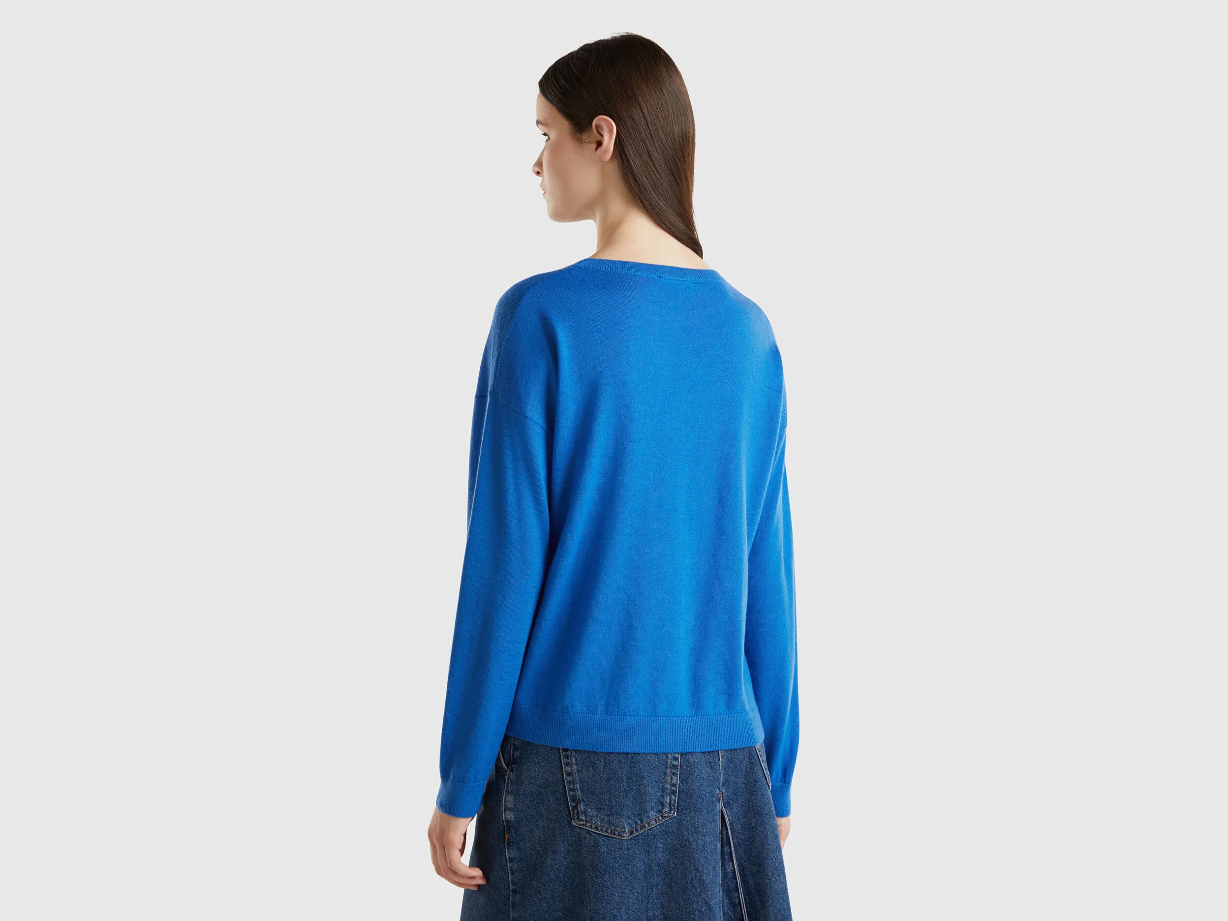 Boat neck sweater in pure Merino wool - Light Blue | Benetton