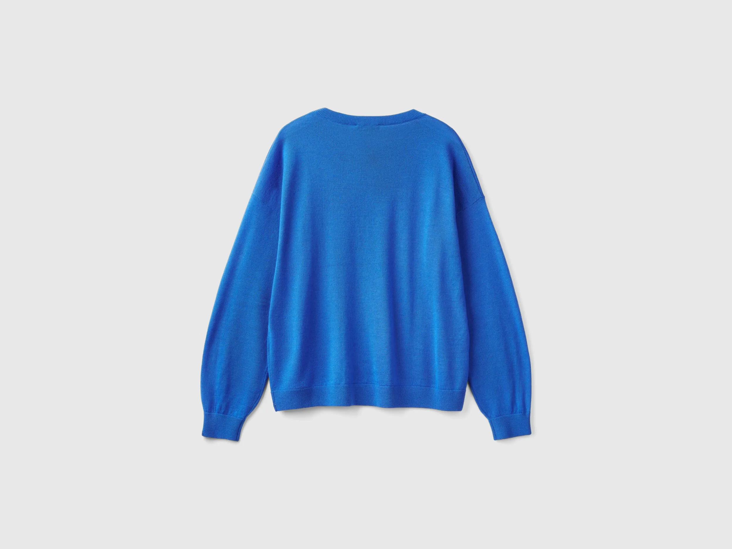 Boat neck sweater in pure Merino wool - Light Blue | Benetton