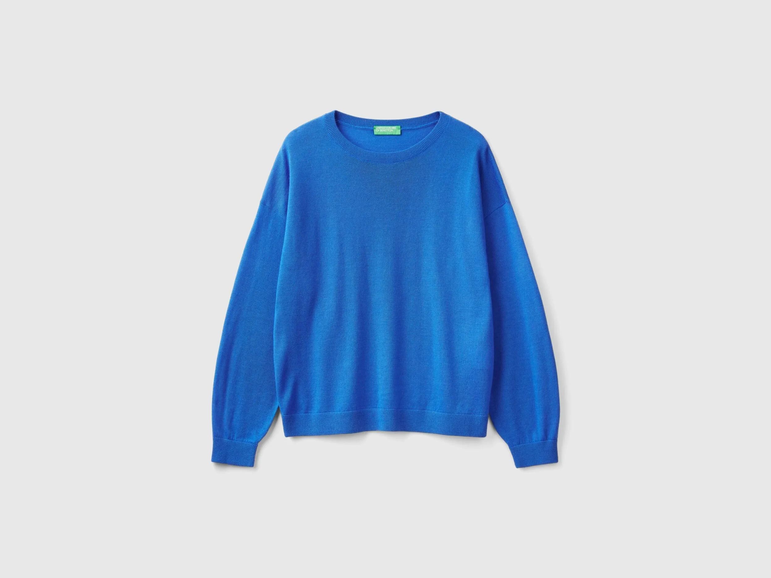 Boat neck sweater in pure Merino wool - Light Blue | Benetton